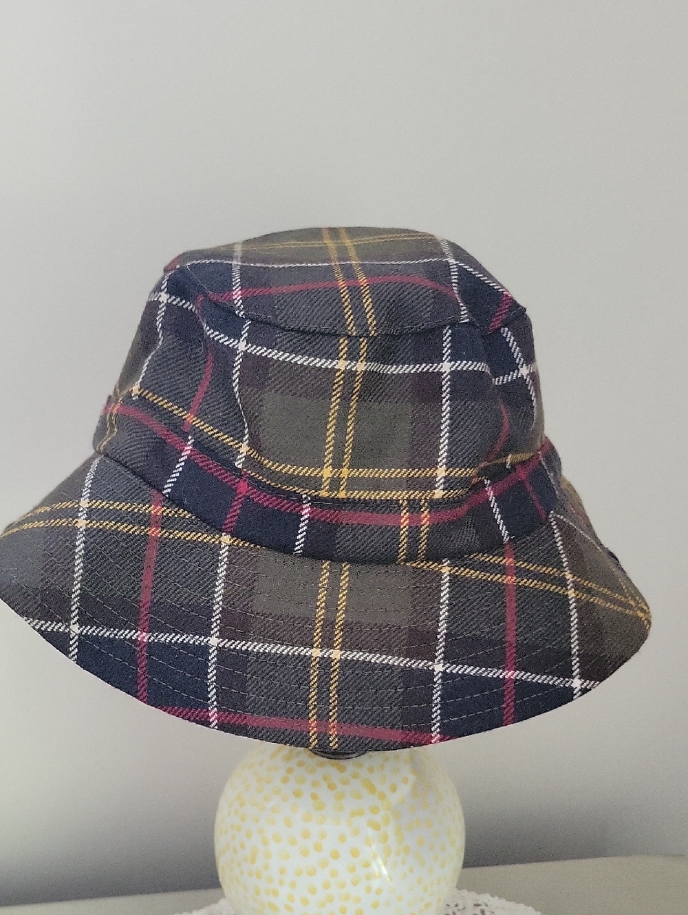 Barbour Plaid Bucket Hat in Black, Olive, Gold, and Burgundy